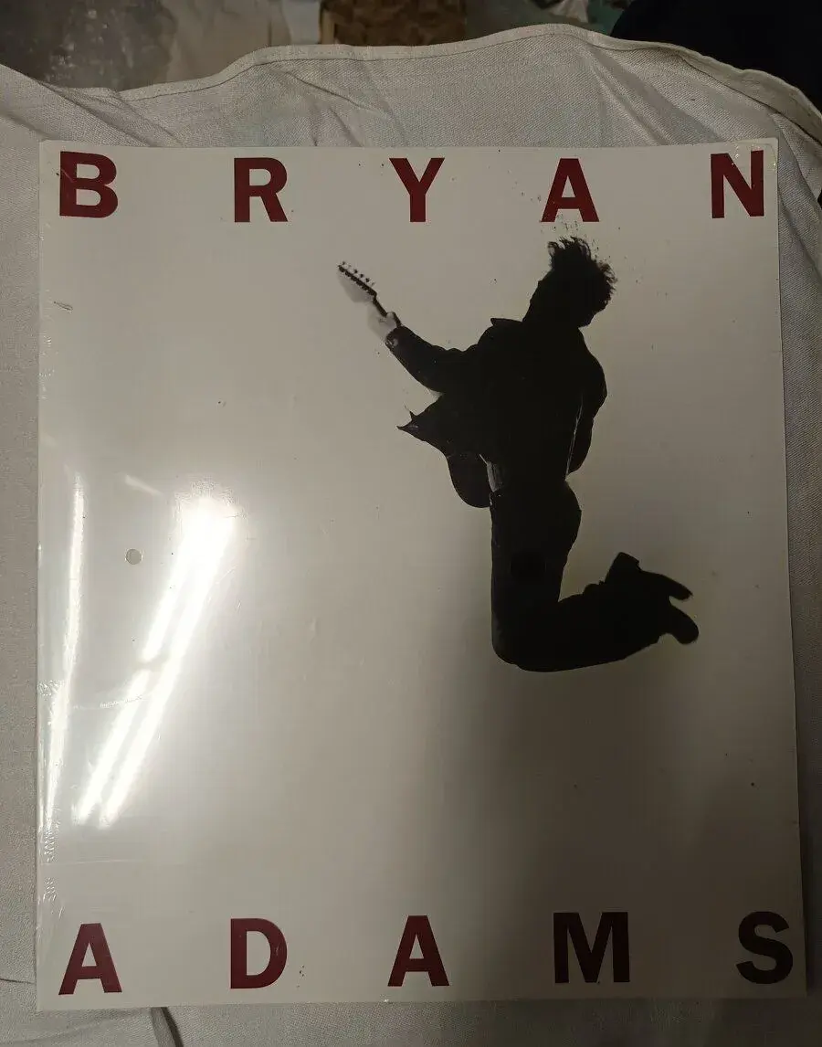 Obrazova kniha s textami od Brian Adamsa