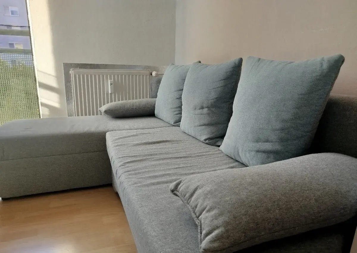 Rohový rozkladací gauč