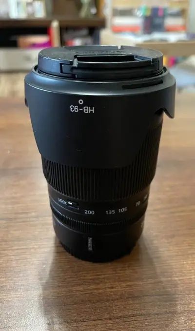 Poškodený objektív Nikkor 24-200 z-mount
