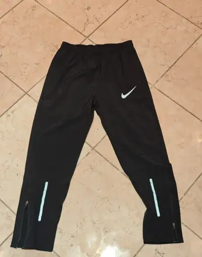NIKE AeroSwift tepláky na behanie