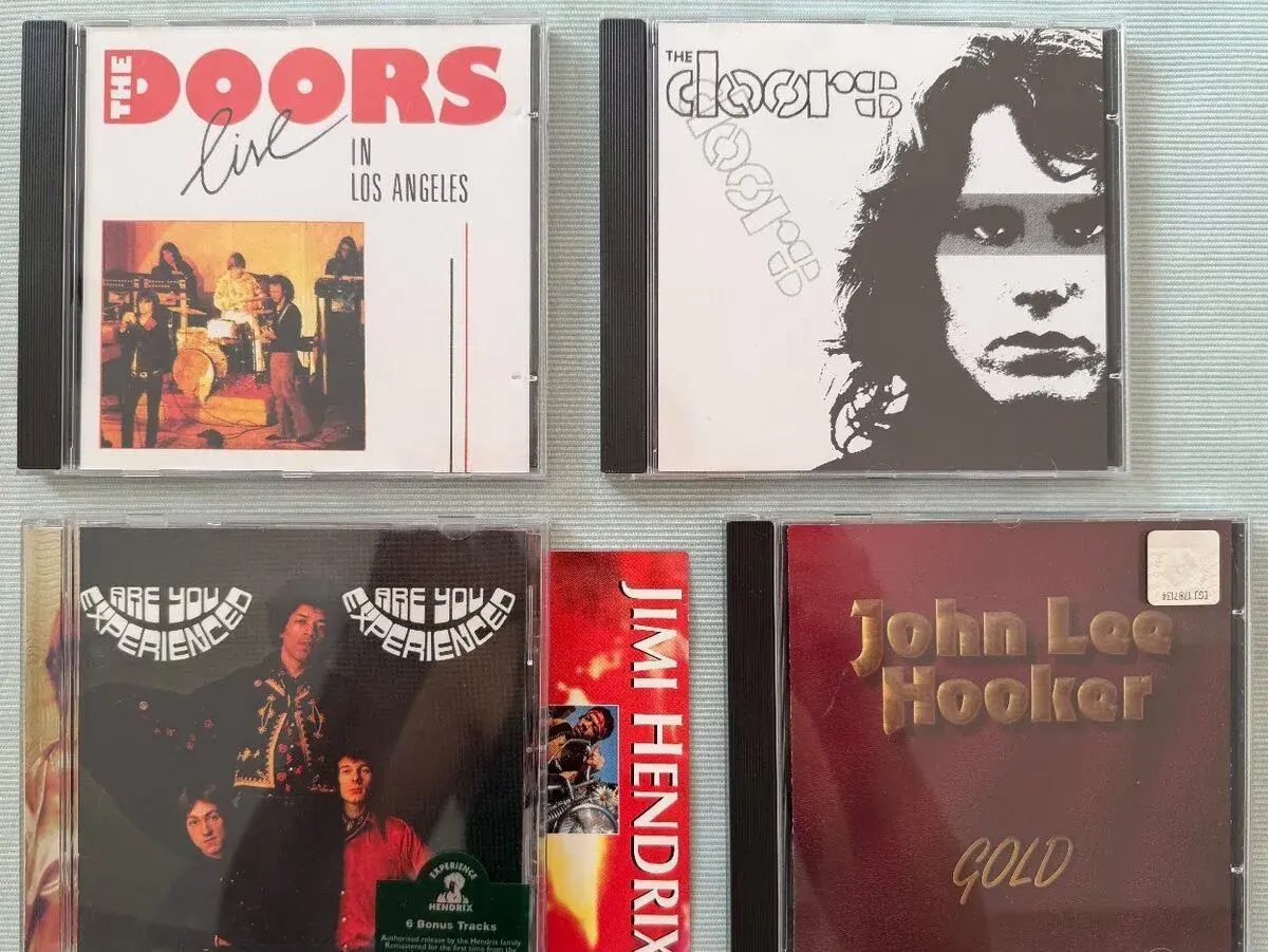 Cdčka The Doors, Jimi Hendrix a John Lee Hooker