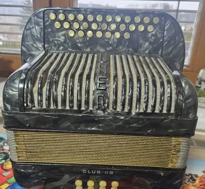 Heligonka Hohner C-F