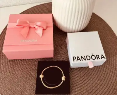 Pandora zlatý zapínací náramok 14k so zlatým príveskom