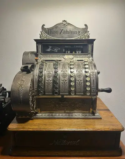 Starožitná mechanická pokladňa