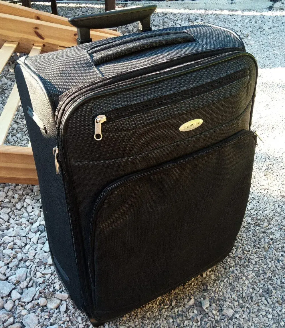 Kufor Samsonite na kolieskach s teleskopickou rukovatou