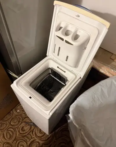 Zvrchu plnenú práčku Whirlpool